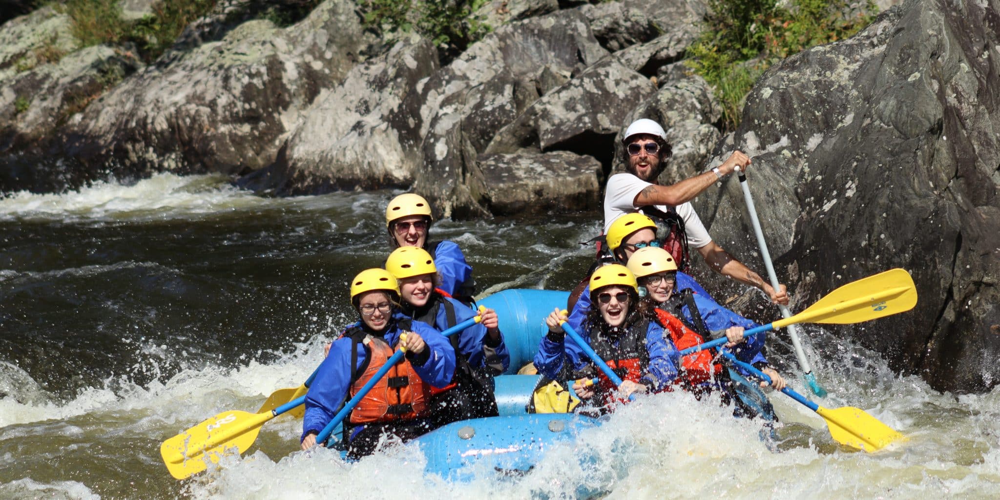 Group of paddlers on whitewater adventure down Deerfield river